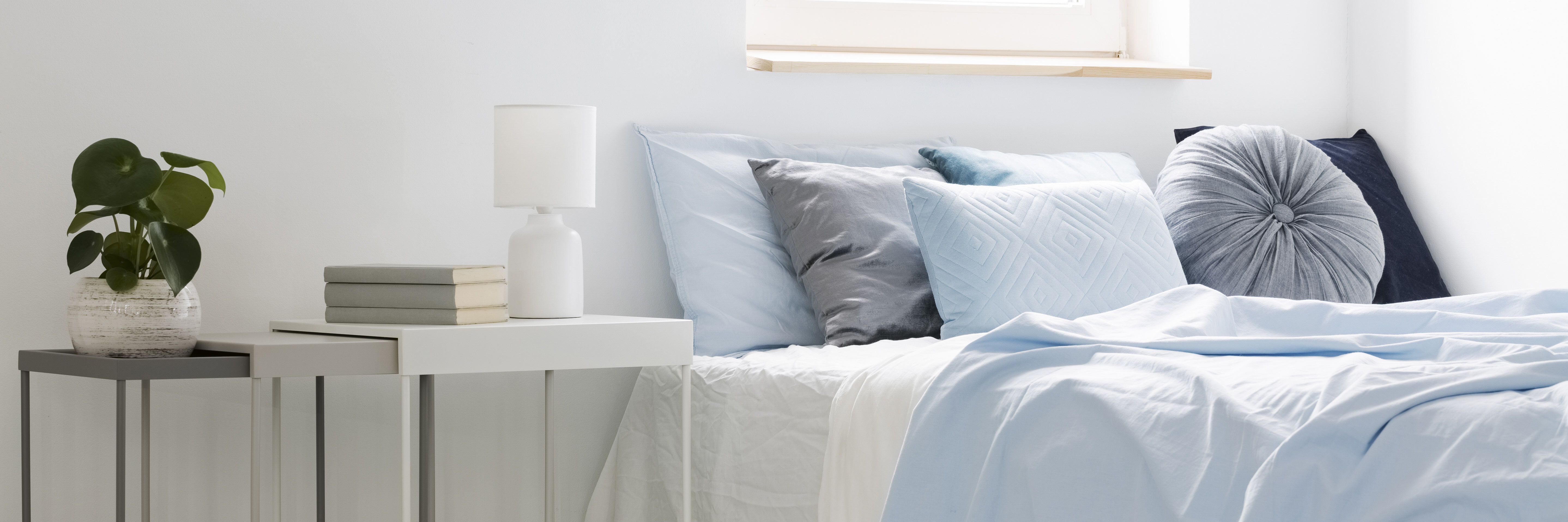 Comfortable-white-bed with comfy pillows